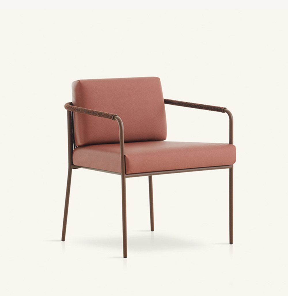 nido stackable hand-woven dining armchair